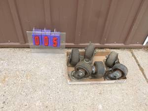 Flat of casters. As shown.