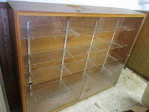 Display case with plastic front doo...