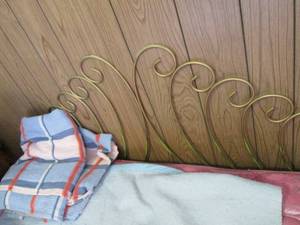 Scrolled metal headboard 56 across...