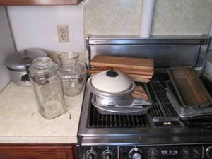 Lot of cutting boards, bakeware and...