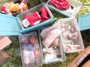 Many small covered totes of craft a...