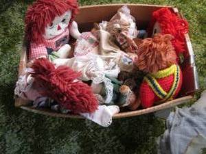 Box filled with dolls...