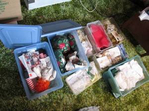 Several small plastic totes of craf...