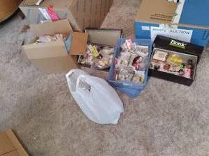 Multiple boxes of crafting doll hea...