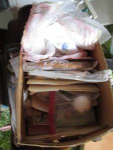 Box filled with vintage crafting ki...