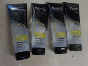 4 - 9 oz Bottles Tresemme Hair Gel...