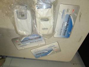 lot 15 image: 2 dispensers and 3 license plate sh...