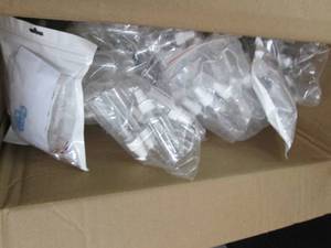 lot 28 image: box full of spray bottles ...