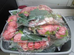 lot 38 image: 10 gallon tote full of fake flowers...