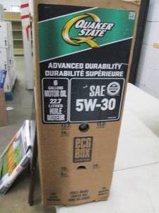 lot 166 image: 6 gallons of quaker sttate sae 5w30...