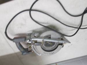 lot 186 image: skilsaw worm drivesaw missing motor...