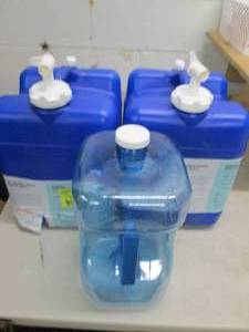 lot 214 image: 3 water containers all have been us...