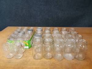 lot 447 image: Lot of (36) Ball  Kerr Mason Canning Jars - Quart & Pint