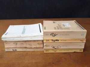 lot 479 image: Caterpillar Parts Manuals - 235C, 345B, 345C Excavators, D6T Track Tractor, 140H Motor Grader and More