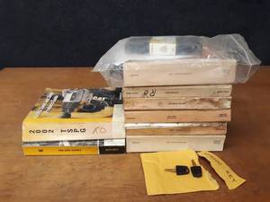 lot 491 image: Caterpillar Parts Manuals - 345C Excavator w 2 Keys, 572G Pipelayer, 330 Excavator, D8N Tractor, 14G Motor Grader