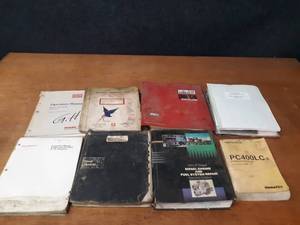 lot 507 image: Lot of (8) Assorted Heavy Equipment Parts Manuals - Terex, Komatsu, Cummins V903, and More
