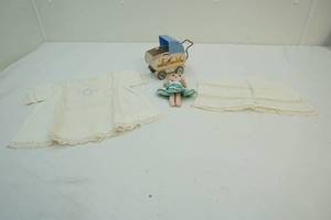 Vintage baby buggy, doll clothes