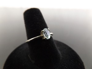 lot 28 image: .925 Sterling Silver Oval Cut Topaz Ring Size 7.25
