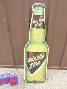 Molson Ice 10 x 34 tin sign. Used in a bar. Smoke dirty. As shown.