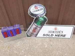 NOS Becks sold here 24 x 17 tin sign. Unused. As shown.