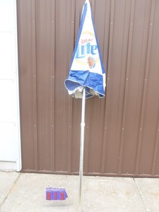 Mille Lite vinyl umbrella. Good used condition. As shown.