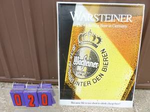 Warsteiner beer tin. 18 x 24. Good used condition. As shown.