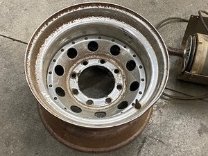 lot 43 image: Lot Of (1) Truck Wheel & (1) Shop-Smith Electric Motor