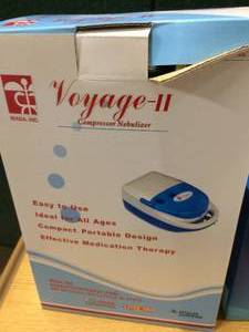 lot 49 image: Voyage-II Compressor Nebulizer and OneTouch UltraMini Blood Glucose Monitoring System