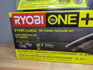lot 11 image: Brand New Ryobi 18V Vacuum Kit & Lithium Ion Battery and Charger & 150 Watt Battery Inverter