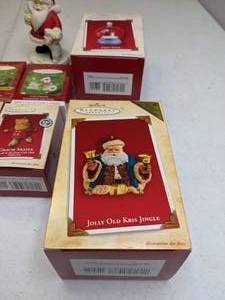 lot 112 image: Set of (9) Hallmark Keepsake Ornaments & Santa Figure