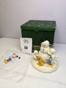 lot 95 image: Adorable Snowbabies Making Snowfriends from the Dept. 56 Guest Collection 2004 with Mickey, Donald, and Pluto