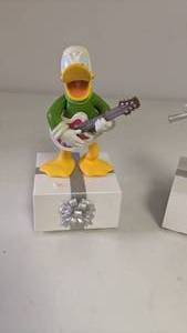 lot 117 image: Set of (2) Hallmark Keepsake Ornaments Donald & Daisy Duck (Battery Operated Musical)