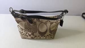 lot 120 image: Authentic Coach Signature Small Bucket Bag & Wristlet 