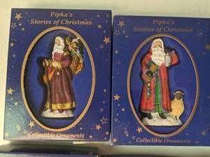 lot 126 image: Set of (8) Pipkas Stories of Christmas Ornaments