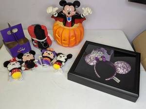 lot 101 image: Mickey Mouse Lot  Mickey Pumpkin Lantern, Washcloth Set, Itty Bitty Minnie & Mickey Plush, Minnie Ears