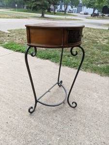 lot 197 image: Elegant Half Moon Entry Table with Scrolled Iron Legs