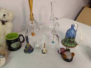 lot 182 image: Mickey Mouse Collectibles, Glass Bells Nesting Dolls and More
