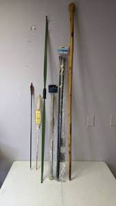 lot 290 image: Get Off My Lawn - Curtain Rods, Bow, Walking Stick