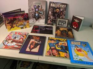 lot 442 image: Mixed Lot of Books Answer me, Liberty Meadows, VG, Law & Chaos, D&D The World Builders Journal, & More