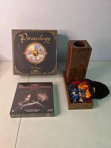 lot 397 image: Pirateology and Blood Bound Games, Dice Rolling Set