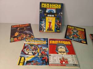 lot 384 image: Paranoia 2nd Edition Game and Comics