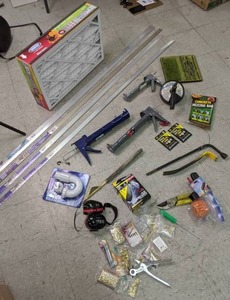 lot 455 image: Mixed Lot of Misc. Tools Caulk Guns, Drill Power Canister Auger, Best Air Air filter, Seam Binder & Carpet Trim, & More