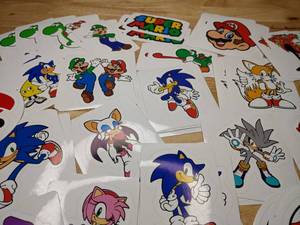 lot 227 image: 65 New Super Mario Bros. & Sonic the Hedgehog Luigi Video Game Stickers Dr. Robotnik Nintendo