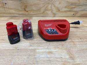 lot 16 image: MILWAUKEE M12 12-Volt Lithium-Ion Battery Charger with 2- M12 12-Volt Lithium-Ion Compact Battery Packs (1.5Ah)