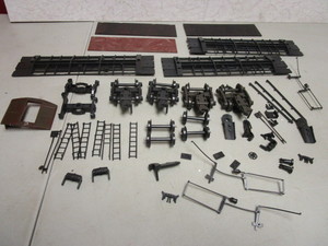 ATLAS O GAUGE ACCESSORIES, TRUCKS, BOXCAR PANELS, COUPLERS, LADDERS, MORE