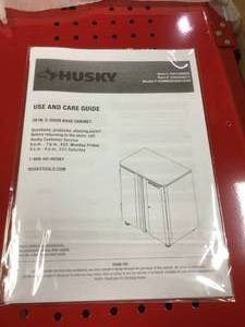 Ready-to-Assemble 23-Gauge Steel 2-Door Garage Base Cabinet in Red (28 in. W x 32 in. H x 18 in. D) by Husky (good condittion)