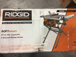 15 Amp 10 in. Table Saw with Folding Stand by RIDGID Customer Returns See Pictures