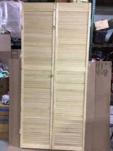 24 in. x 80 in. Louver Pine Unfinished Interior Closet Bi-fold Door by Veranda Customer Returns See Pictures