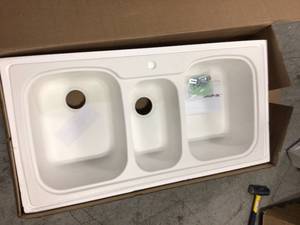 Drop-InUndermount Solid Surface 44 in. 1-Hole 402040 Triple Bowl Kitchen Sink in White by Swan Customer Returns See Pictures