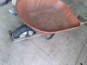 Heavy duty orange painted metal buc...